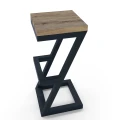 Industrial custom-made bar stool Aran, black frame, oiled oak top